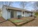 Home's back elevation, patio, and yard at 5346 Shefford Ct, Indianapolis, IN 46254