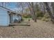 Backyard with patio, landscaping, and detached shed at 5346 Shefford Ct, Indianapolis, IN 46254