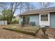 Backyard with patio and trees in fall at 5346 Shefford Ct, Indianapolis, IN 46254