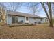 Home's back elevation and patio area at 5346 Shefford Ct, Indianapolis, IN 46254