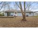 Backyard of a house with patio and trees at 5346 Shefford Ct, Indianapolis, IN 46254