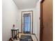 Small entryway with door, table, and rug at 5346 Shefford Ct, Indianapolis, IN 46254