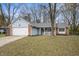 Ranch home with attached garage and front porch at 5346 Shefford Ct, Indianapolis, IN 46254