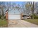 Ranch home with attached garage and front porch at 5346 Shefford Ct, Indianapolis, IN 46254
