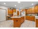 Large kitchen with oak cabinets and granite island at 1079 Old Eagle Way, Greenwood, IN 46143