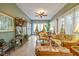 Relaxing sunroom with wicker furniture and ample natural light at 1079 Old Eagle Way, Greenwood, IN 46143