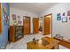 Multi-purpose basement area with wood flooring and access to other rooms at 1079 Old Eagle Way, Greenwood, IN 46143