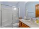 Clean basement bathroom with shower/tub combo and wood vanity at 1079 Old Eagle Way, Greenwood, IN 46143