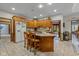 Large kitchen with oak cabinets and granite island at 1079 Old Eagle Way, Greenwood, IN 46143