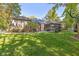 Brick house exterior with landscaped yard and screened porch at 1079 Old Eagle Way, Greenwood, IN 46143