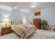 Basement bedroom with a queen-size bed and wood furniture at 1079 Old Eagle Way, Greenwood, IN 46143