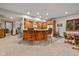 Finished basement with wet bar, game table, and comfortable seating at 1079 Old Eagle Way, Greenwood, IN 46143
