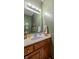 Bathroom with wood vanity, single sink, and linen towels at 1079 Old Eagle Way, Greenwood, IN 46143