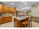 Spacious kitchen with oak cabinets and granite island at 1079 Old Eagle Way, Greenwood, IN 46143