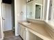 Bathroom with double vanity and a separate toilet area at 4720 Stoughton Ct, Indianapolis, IN 46254