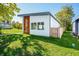 Modern, single story home with white siding and wood accents at 318 N Tacoma Ave, Indianapolis, IN 46201