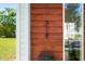 House number 318 on a modern wood exterior at 318 N Tacoma Ave, Indianapolis, IN 46201