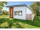Modern home with white siding and a wood accent wall at 318 N Tacoma Ave, Indianapolis, IN 46201