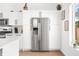 Modern kitchen with stainless steel appliances and white cabinets at 318 N Tacoma Ave, Indianapolis, IN 46201