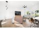 Bright living room with hardwood floors and comfy seating at 318 N Tacoma Ave, Indianapolis, IN 46201