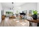 Open concept living area with modern furniture and hardwood floors at 318 N Tacoma Ave, Indianapolis, IN 46201