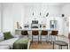 Modern kitchen with white cabinets and a breakfast bar at 318 N Tacoma Ave, Indianapolis, IN 46201