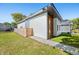 Modern home with white siding, wood accents, and a fenced yard at 318 N Tacoma Ave, Indianapolis, IN 46201