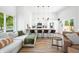 Modern kitchen with white cabinets and a large island at 318 N Tacoma Ave, Indianapolis, IN 46201