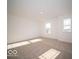 Well-lit bedroom with carpeted floors and large windows at 5856 Sleighbell Dr, Greenwood, IN 46143