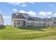 Two-story home with covered patio and spacious backyard at 802 Weldon Way, Westfield, IN 46074