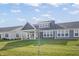 Private backyard with covered patio and green grass at 802 Weldon Way, Westfield, IN 46074