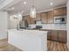 Modern kitchen with stainless steel appliances and island at 802 Weldon Way, Westfield, IN 46074