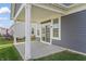 Covered patio with view of the backyard and neighborhood at 802 Weldon Way, Westfield, IN 46074