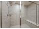 Large walk-in shower with tile surround and seat at 802 Weldon Way, Westfield, IN 46074