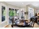 Breakfast nook with view of backyard patio at 15571 Bridgewater Club Blvd, Carmel, IN 46033