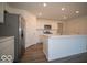Modern kitchen with stainless steel appliances and island at 6105 Card Blvd, Indianapolis, IN 46221