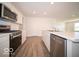Modern kitchen features stainless steel appliances and light-colored cabinetry at 6105 Card Blvd, Indianapolis, IN 46221