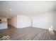 Spacious living area with hardwood floors and an open floor plan at 6105 Card Blvd, Indianapolis, IN 46221