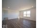 Spacious living room with vinyl plank flooring and lots of natural light at 6105 Card Blvd, Indianapolis, IN 46221