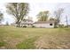 Large backyard with home and garage in view at 216 E Elm St, Jamestown, IN 46147