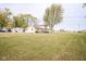Spacious backyard, view of home and partial neighborhood view at 216 E Elm St, Jamestown, IN 46147