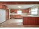 U-shaped kitchen featuring ample wood cabinetry at 216 E Elm St, Jamestown, IN 46147