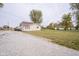House exterior with gravel driveway and yard at 216 E Elm St, Jamestown, IN 46147