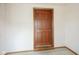 Wood door in a simple interior space at 216 E Elm St, Jamestown, IN 46147