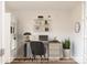 Modern home office featuring built-in shelving and a workspace at 4407 W Wandalee Ct, New Palestine, IN 46163
