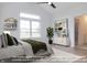 Bright bedroom with large windows and stylish decor at 4407 W Wandalee Ct, New Palestine, IN 46163