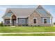 Front view of two-story craftsman home at 4407 W Wandalee Ct, New Palestine, IN 46163