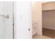 Bathroom with shower, vanity, and linen closet at 4407 W Wandalee Ct, New Palestine, IN 46163