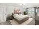 Spacious bedroom with a king-size bed and neutral decor at 5445 Carnoustie Cir # 12A, Avon, IN 46123