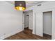 Spacious bedroom with wood-look floors and a large closet at 108 E St Clair St # B, Indianapolis, IN 46204